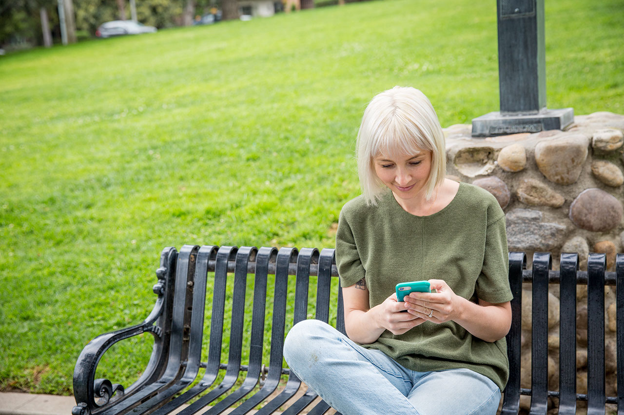 Woman outside on phone